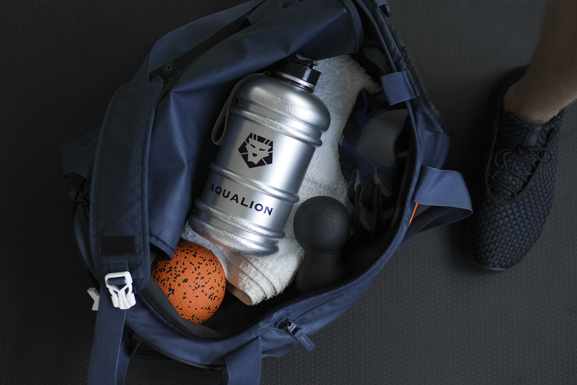 Back with sport equipment and bottle for water