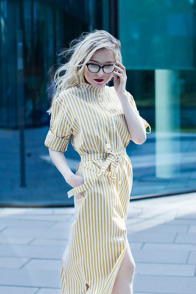 Girl in a long dress with glasses